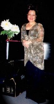 Claudia performs at Odettes
