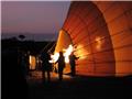 Inflating a balloon for sunrise safari