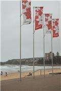Season's Greeting flags decorate Manly Beach