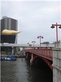 View of Asahi building across the Sumida river