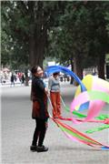 Temple of Heaven: Woman twirling a ribbon