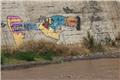Graffiti on the banks of the Mapocho river near the sculpture park