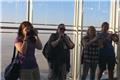 Taking pictures of our reflections at Burj Khalifa