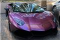 Purple Lamborghini in front of Burj Al Arab 