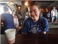 Megan stares at the almost hour old Butterbeer