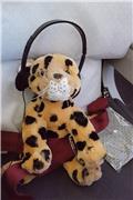 Plush cheetah enjoys the flight to Qatar