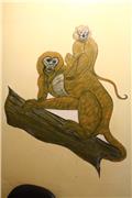 Monkeys painted on hotel room wall