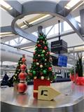 Christmas decorations at baggage claim